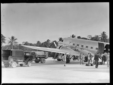 Loading of a C47 transport aircraft at Pallikulo airfield, Espiritu Santo, Vanuatu