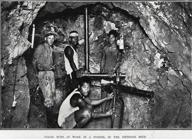 Fijian boys at work in a tunnel in the Emperor Mine