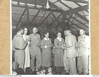 PORT MORESBY, NEW GUINEA. 1943-11-06. AT THE FAREWELL DINNER, HELD AT HEADQUARTERS, NEW GUINEA FORCE, GIVEN TO NX363 LIEUTENANT GENERAL SIR IVEN MACKAY, KBE, CMG, DSO, VD., TO CELEBRATE HIS ..