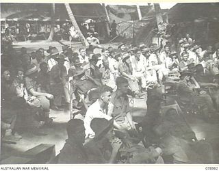 AITAPE, NEW GUINEA. 1945-02-20. A SECTION OF THE AUDIENCE AT A CONCERT GIVEN FOR PATIENTS OF THE 104TH CASUALTY CLEARING STATION BY THE DICK BENTLEY CONCERT PARTY