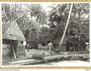 KWIARA, CHINA STRAITS, 1943-07-06. VIEW SHOWING PART OF THE 1ST AUSTRALIAN WATER TRANSPORT GROUP MAINTENANCE BASE CAMP