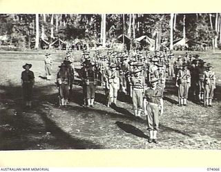 SIAR, NEW GUINEA. 1944-06-21. NO 7 PLATOON, A COMPANY, 57/60TH INFANTRY BATTALION ON PARADE. IDENTIFIED PERSONNEL ARE:- VX81103 MAJOR W. MCCALL (1); VX14600 LIEUTENANT L. TALBOT (2); VX141787 ..