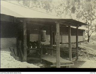 Port Moresby. 1944-03. An electric message conveyor designed to carry messages between Signal Office, 18th Australian Lines of Communication Signals and Headquarters, New Guinea Force. Messages in ..