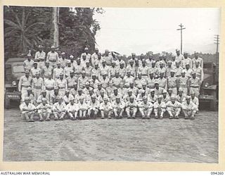 LAE AREA, NEW GUINEA. 1945-07-23. OFFICERS AND ENLISTED MEN OF 35/31 AMERICAN TRUCK COMPANY, WHICH OPERATES AT LAE AND NADZAB TRANSPORTING AMERICAN AND AUSTRALIAN STORES