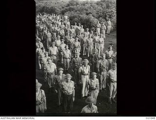 KIRIWINA, TROBRIAND ISLANDS, PAPUA. C. 1944-03. GROUP PORTRAIT OF AIRMEN OF NO. 30 (BEAUFIGHTER) SQUADRON RAAF ON COMMANDING OFFICER'S PARADE