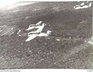 1943-04-16. NEW GUINEA. MILNE BAY. BEAUFORT BOMBERS PRACTICE AT MILNE BAY. (NEGATIVE BY N. BROWN)