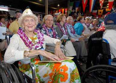 A U.S. Navy World War II nurse and Pearl Harbor survivor waits for the commencement of a joint U.S. Navy/National Park Service ceremony commemorating the 65th anniversary of the attack on Pearl Harbor, Hawaii, on Dec. 7, 2006. More than 1,500 Pearl Harbor survivors, their families and friends from around the nation joined more than 2,000 distinguished guests and the general public for the annual observance. (U.S. Navy PHOTO by Mass Communication SPECIALIST 1ST Class James E. Foehl) (Released)