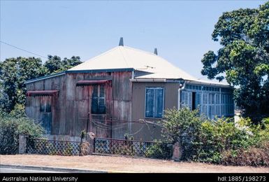 New Caledonia - reddish corrugated iron building