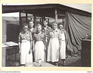 CAPE WOM, WEWAK AREA, NEW GUINEA. 1945-09-15. COOKS OF HEADQUARTERS 6 DIVISION. IDENTIFIED PERSONNEL ARE:- SERGEANT J. HANSON (1); PRIVATE D.J. MCCARTHY (2); PRIVATE A. GREVER (3); PRIVATE A. PIPER ..