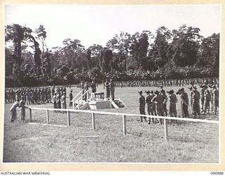 TOROKINA, BOUGAINVILLE. 1945-09-24. A GENERAL VIEW OF PARADE BY MEMBERS OF 15 INFANTRY BRIGADE, AT GLOUCESTER PARK DURING THE PRESENTATION OF AWARDS BY MAJOR GENERAL W. BRIDGEFORD, GENERAL OFFICER ..