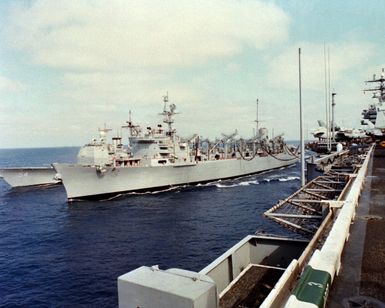 The fast combat support ship USS CAMDEN (AOE-2) conducts a routine underway replenishment operation with the guided missile cruiser USS ANTIETAM (CG-54) and the nuclear-powered aircraft carrier USS CARL VINSON (CVN-70) off the coast of Hawaii