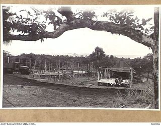 DREGER HARBOUR, NEW GUINEA. 1943-12-05. 342ND UNITED STATES FIGHTER SQUADRON MEN'S QUARTERS IN THE COURSE OF CONSTRUCTION