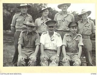 LAE, NEW GUINEA. 1944-08-03. STAFF OF HEADQUARTERS, 8TH SALVAGE DEPOT LINES OF COMMUNICATION. IDENTIFIED PERSONNEL ARE:- SX30141 CORPORAL G.F. KING (1); QX54219 SERGEANT E.H. LITTE (2); VX123307 ..