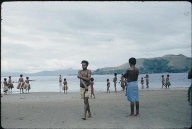 The audience is playing on the beach and in the water : Goodenough Island, D'Entrecasteaux Islands, Papua New Guinea, 1956-1958 / Terence and Margaret Spencer