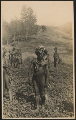 [Native of the Zau River district, wearing a hat made out of feathers and beaten bark , Central New Guinea], 1933