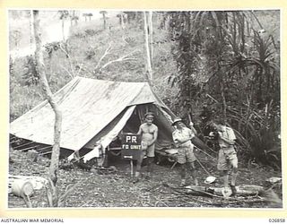 PAPUA, NEW GUINEA. 1942-10. PRESS CORRESPONDENTS CAMP IN THE FORWARD AREA
