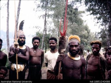 Men with decorative spears