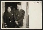 Lt. James Oda with an Army friend, Lt. Jack Waldo, visits the Tasaka home in Washington while on leave from