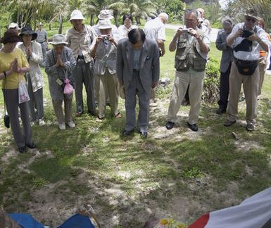 Twenty-seven Japanese veterans from tank units stationed on the neighboring island of Saipan during World War II (WWII) came to pay respects to fallen comrades during a 60th Anniversary reunion. These veterans had family and friends stationed on Guam, and they didn't learn of their fates for years following the war. They came today with their families to place flowers, burn incense, light candles and give prayers at Tarague Beach a sight of major conflict during the war. The Japanese tank units at Tarague were the last enemy tanks on Guam and with their destruction by the United States Marine Corp (USMC) all organized resistance on Guam had ended