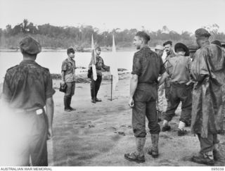 MIVO RIVER AREA, BOUGAINVILLE, 1945-08-18. FIRST CONTACT BETWEEN THE JAPANESE SURRENDER ENVOY AND AUSTRALIAN TROOPS ON BOUGAINVILLE. MAJOR OTSU (1) AND SUPERIOR PRIVATE TAKESHITA (2), WHO IS ..