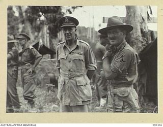 BOIKEN AREA, AITAPE-WEWAK SECTOR. 1945-04-28. LIEUTENANT GENERAL V.A.H. STURDEE, GENERAL OFFICER COMMANDING FIRST ARMY (1), AND LIEUTENANT COLONEL I. HUTCHISON, 2/3 INFANTRY BATTALION (2), AT ..