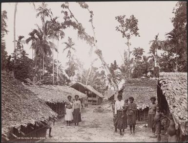 Women and children in the village of Suholo, Ulawa, Solomon Islands, 1906 / J.W. Beattie