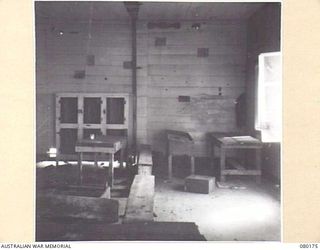 SATTELBERG, NEW GUINEA. 1944-07-04. THE INTERIOR OF THE MISSION SCHOOL SITUATED AT THE TOP OF SATTELBERG