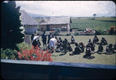 Doctor's wife buying daily vegetables; payment in exchange salt, beads, paper (later with money) : Wahgi Valley, Papua New Guinea, 1954-1955 / Terence and Margaret Spencer