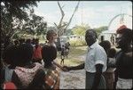 Man and Frances Harwood shaking hands