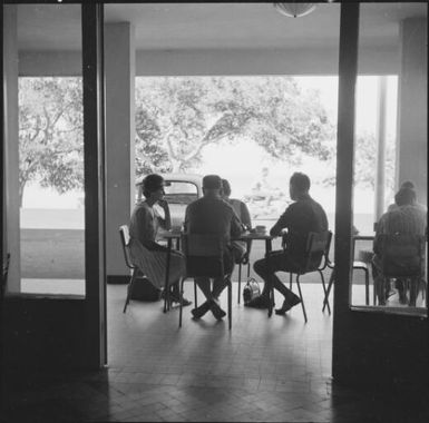 People having afternoon tea on a verandah, Noumea, New Caledonia, 1967 / Michael Terry