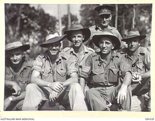 TOROKINA, BOUGAINVILLE. 1945-07-26. THE FIRST CONTINGENT OF "FIVE YEAR RELEASE PERSONNEL" TO LEAVE FOR THE RETURN TO AUSTRALIA. ALL THESE MEN HAVE COMPLETED FIVE YEARS IN THE ARMY AND ARE BEING ..