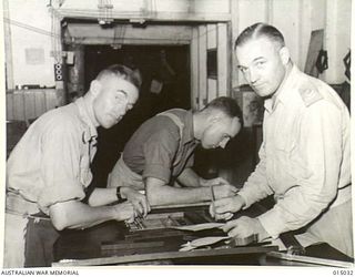 1943-06-18. NEW GUINEA. NEWSPAPERS PUBLISHED BY THE ARMY ARE ONE OF THE MOST POPULAR AMENITIES FOR THE TROOPS. HERE IS THE EDITOR MAJOR R.B. LEONARD, OF ST KILDA, MELBOURNE, ("GUINEA GOLD") ON THE ..