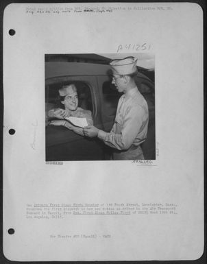 Wac Private First Class Flora Meunier Of 186 Fourth Street, Leominster, Mass., Receives The First Dispath In Her New Duties As Driver In The Air Transport Command In Hawaii, From Pvt. First Class Hollas Floyd Of 2513 1/2 West 18Th St., Los Angeles, Calif. (U.S. Air Force Number 59361AC)