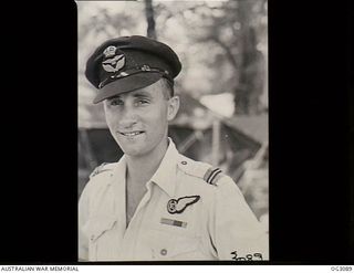 LEYTE, PHILIPPINES. 1945-06-23. PORTRAIT OF 27447 FLYING OFFICER R. M. "BOB" CALWELL DFC, FLIGHT ENGINEER OF BRIGHTON, SA, WHO HAS FLOWN IN CATALINA AIRCRAFT SINCE THE GRIM MONTHS OF 1942. HE ..
