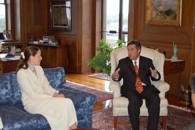 Assistant Secretary for Policy, Management, and Budget, P. Lynn Scarlett, left, with visiting Governor of Guam, Felix Camacho, at Department of Interior headquarters meeting