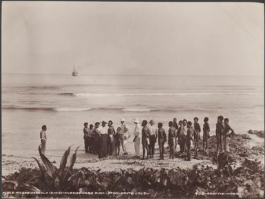 Local people with missionaries on a beach at Otivi, Santa Cruz Islands, 1906 / J.W. Beattie