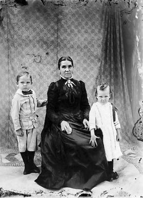 Elderly woman and two children