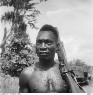 HANSA BAY, NEW GUINEA. 1944-07-08. SERGEANT TAPIOLI, A BAYONET EXPERT AND FORWARD SCOUT OF NO. 5 PLATOON, A COMPANY, 1ST PAPUAN INFANTRY BATTALION. HE HAS BEEN RECOMMENDED FOR THE DISTINGUISHED ..