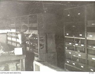 LAE, NEW GUINEA. 1944-03-30. THE INTERIOR OF THE JEEP DETAIL ISSUE STORE, NO. 1 SUB DEPOT, 103RD FIELD AMMUNITION DEPOT