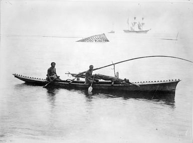 Men in a fishing canoe, Samoa
