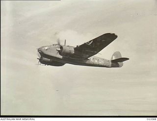 WEWAK AREA, NORTH NEW GUINEA. 1945-01-19. BEAUFORT BOMBER AIRCRAFT, CODE QH-X, SERIAL NO. A9-626, OF NO. 100 SQUADRON RAAF IN FLIGHT. IT IS HELPING TO MAKE LIFE SHORT, MISERABLE AND UNPROFITABLE ..