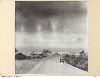 LAE, NEW GUINEA. 1944-11-23. A JEEP IN MOVEMENT FROM THE HARBOUR