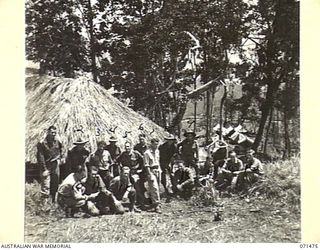 RAMU VALLEY, NEW GUINEA, 1944-03-26. PERSONNEL AT HEADQUARTERS, 15TH INFANTRY BRIGADE. IDENTIFIED PERSONNEL ARE: VX14737 CAPTAIN G.A. WILLIAMS (1); VX147591 PRIVATE W.A. WILLIAMS (2); VX112180 ..