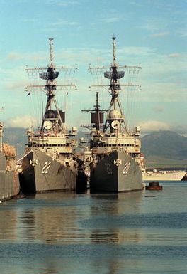 The guided missile destroyers USS BENJAMIN STODDERT (DDG-22), left, and USS GOLDSBOROUGH (DDG-20) lie tied up beside one another at the naval station.