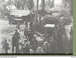 AITAPE, NORTH EAST NEW GUINEA. 1944-04-22. RAAF GROUND CREWS WHO LANDED WITH AMERICAN SHOCK TROOPS, THE FIRST RAAF PERSONNEL TO GO INTO ACTION WITH LAND FORCES ON INVASION DAY, MARCH IN BATTLE ..