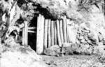 Entrance to a cave, boarded off