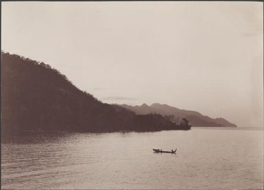 A canoe off the eastern coast of Ysabel, viewed from Mara-na-tabu, Solomon Islands, 1906 / J.W. Beattie