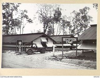 JACQUINOT BAY, NEW BRITAIN, 1945-08-11. THE ENTRANCE TO THE 5 DIVISION RECEPTION CAMP