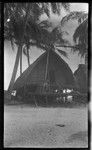 People on house porch at Chiria village, also Tsiria village, on Yule Island, Central Privnce