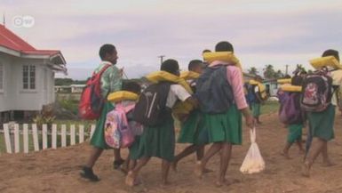 Common economy: women in Fiji Islands assist their husbands